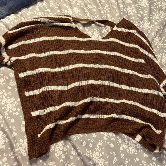 I'm selling a cross back sweater. Fun for that fall look. Off the market soon. - Picture 3 of 3